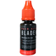 Bottle of blade oil with red cap and black label on a transparent background