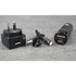 Black nose and ear trimmer charging port, USB-C, cable, and portable charger on a gray surface