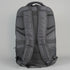 Dark backpack on a light gray background