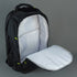Black backpack with open front compartment on a gray background