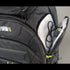 Black backpack with 'TRANSFORM U' branding on a gray background