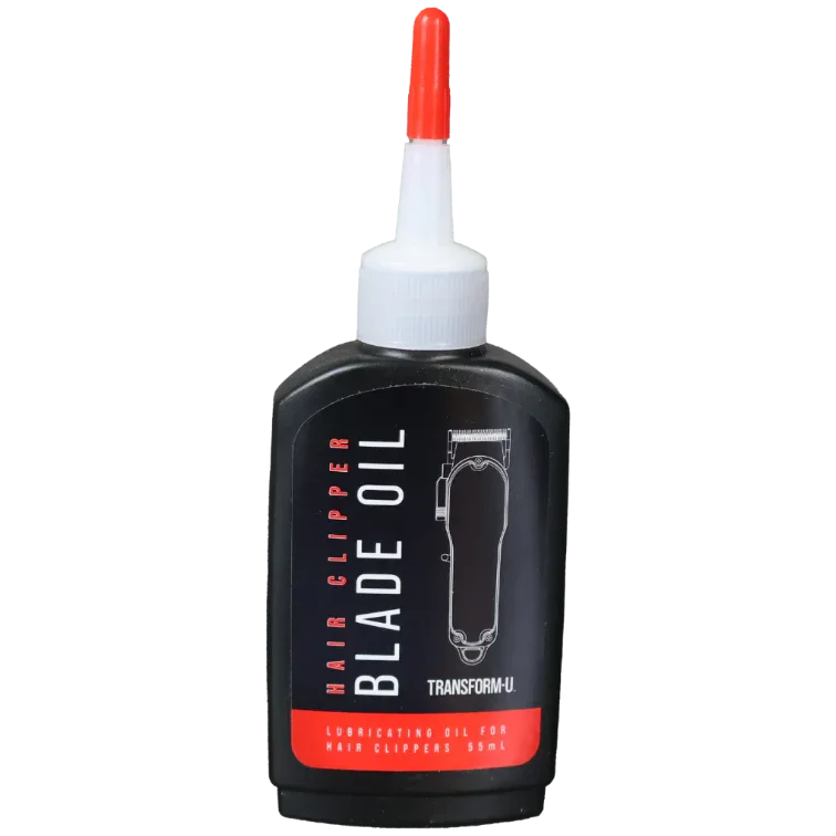Hair clipper blade oil bottle with black label and red cap on transparent background