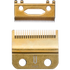 Two gold-colored hair clipper blades on a white background