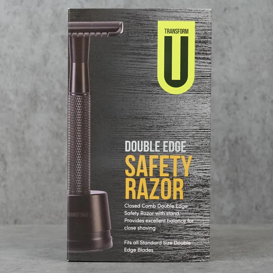 Box of a double edge safety razor on a gray background