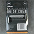 Package of a guide comb on a gray concrete surface