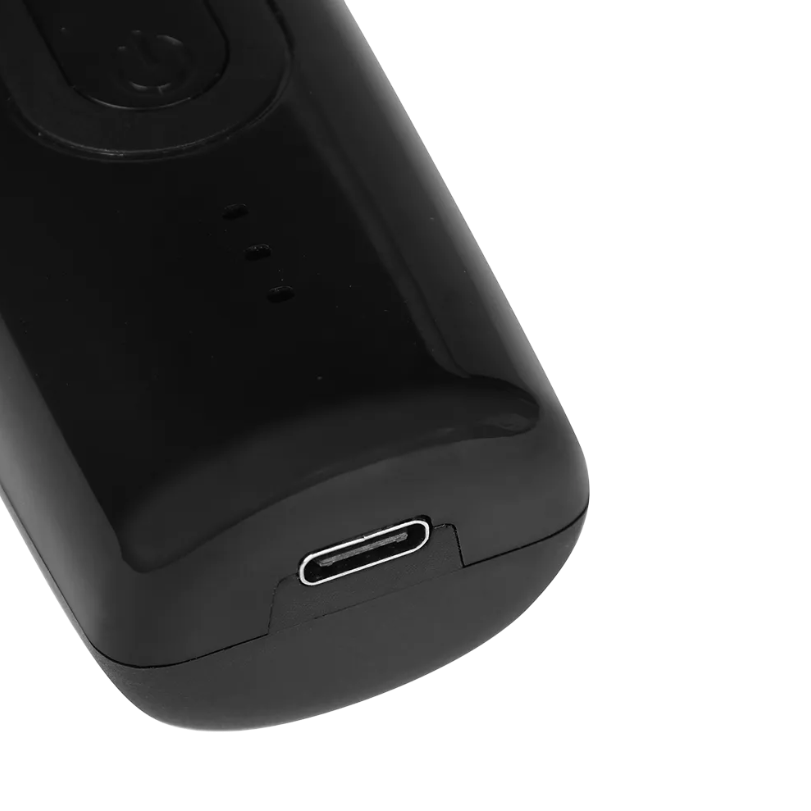 Black body groomer with USB-C port on a transparent background