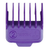 Purple hair clipper comb on a textured gray background