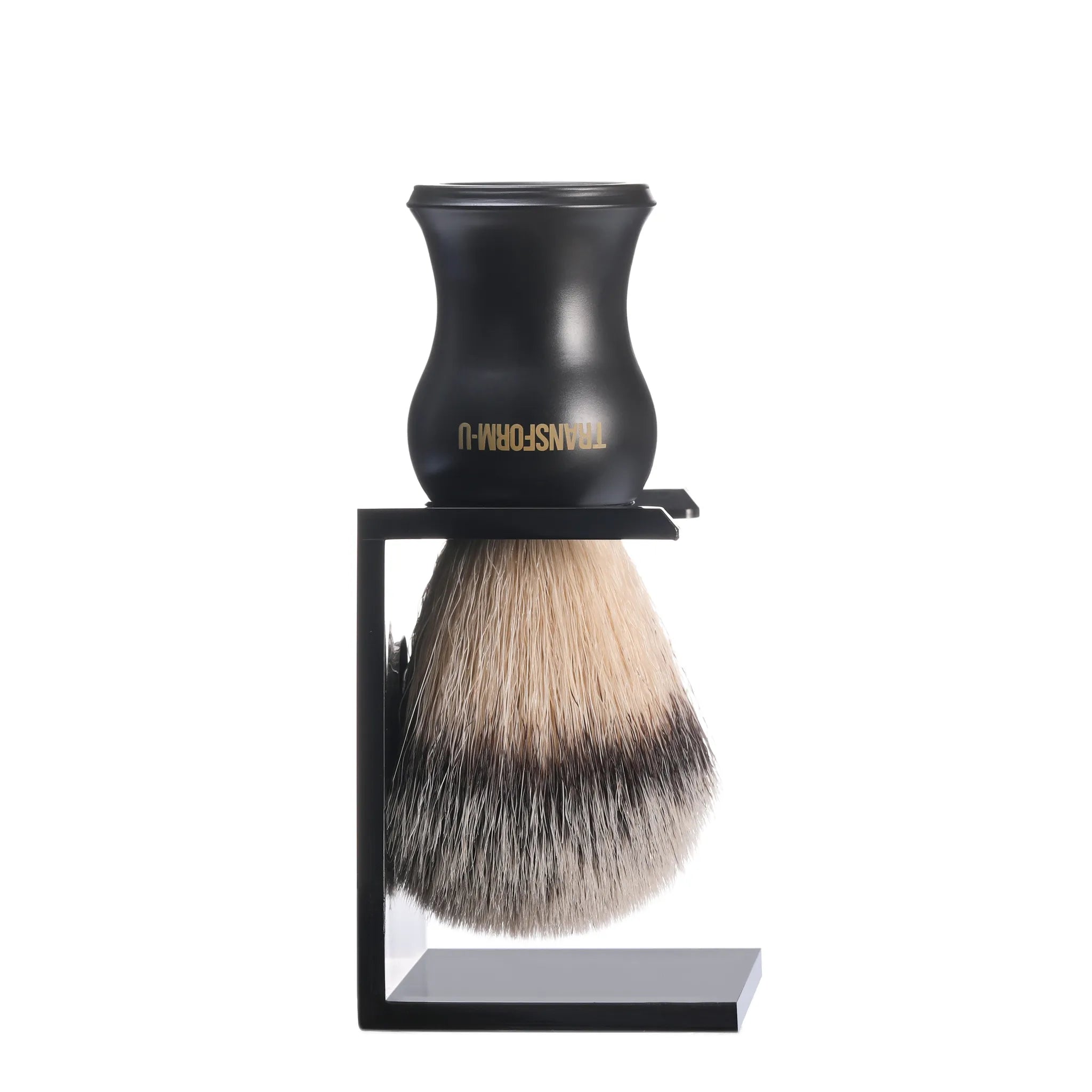 Shaving brush with black holder on a white background