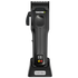 a black hair clipping on its charging stand against a transparent background