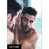 a man looking at his hair in the mirror with text overlay displaying 'use at home'