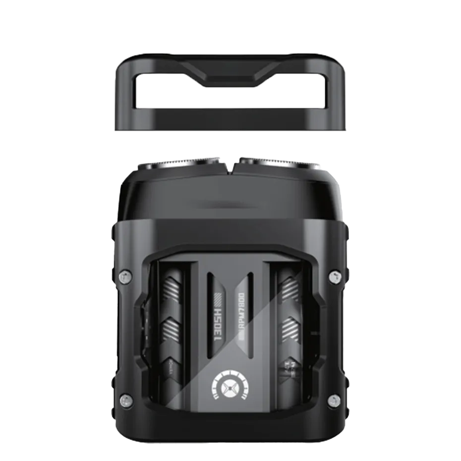 Black rotary travel shaver with protective cap on a transparent background