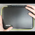 Carbon fiber texture case with 'Transform U' branding held by hands on a gray background