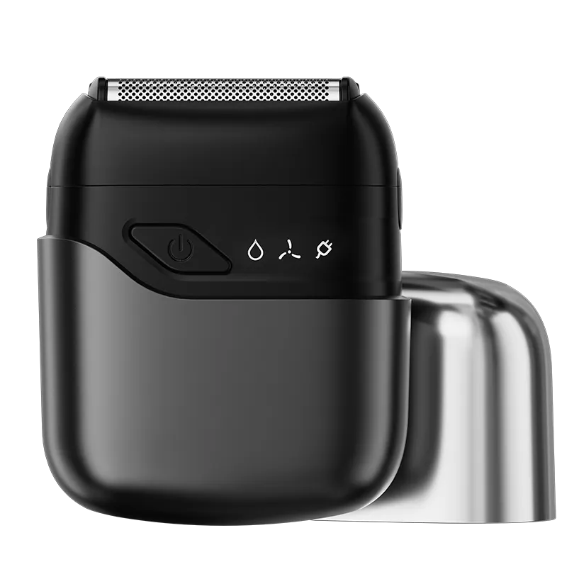 Black electric shaver with a metallic protective cover on a transparent background